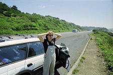 Carol watches the coast.
