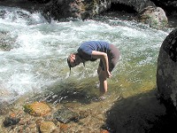 Carol in a creek