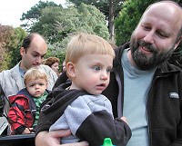 Tom a Lukas ride a choo-choo train at the ZOO