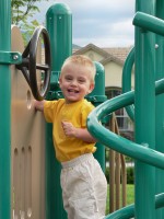 Tom on a jungle gym