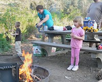 Princess Lisa at a campfire