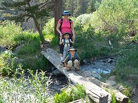 Carol, Lisa and Tom on a bridge