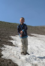 Tom making faces that snow is cold