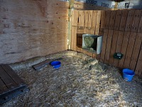 Shed is insulated, equipped with bedding, hay and water &mdash; ready for the goats.