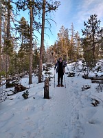 Tom is still smiling.