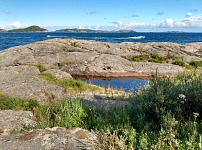 Mandal: motorová rychloloď u Sjøsandenu.